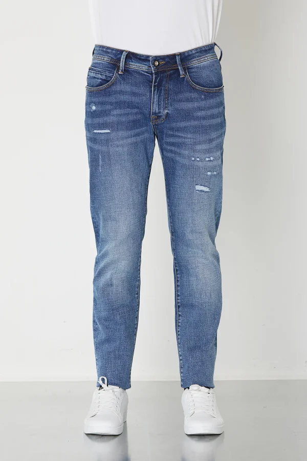 ADAM- DENIM SLIM LAV.MEDIO C/ ROTTURE – UTA6107